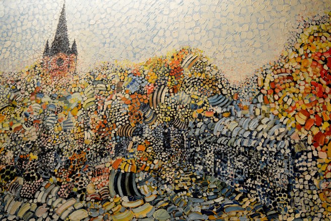 Färgsprakande. Någon som inspirerats av blommor på Lovisa marknad? Vår kyrka syns i alla fall i bakgrunden.