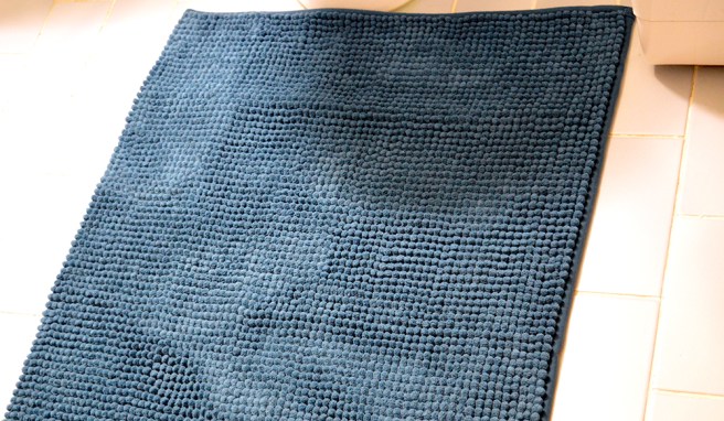 Blå badrumsmatta.